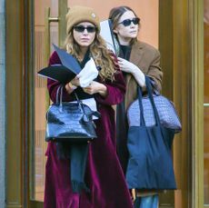 Mary-Kate and Ashley Olsen matching croc bags