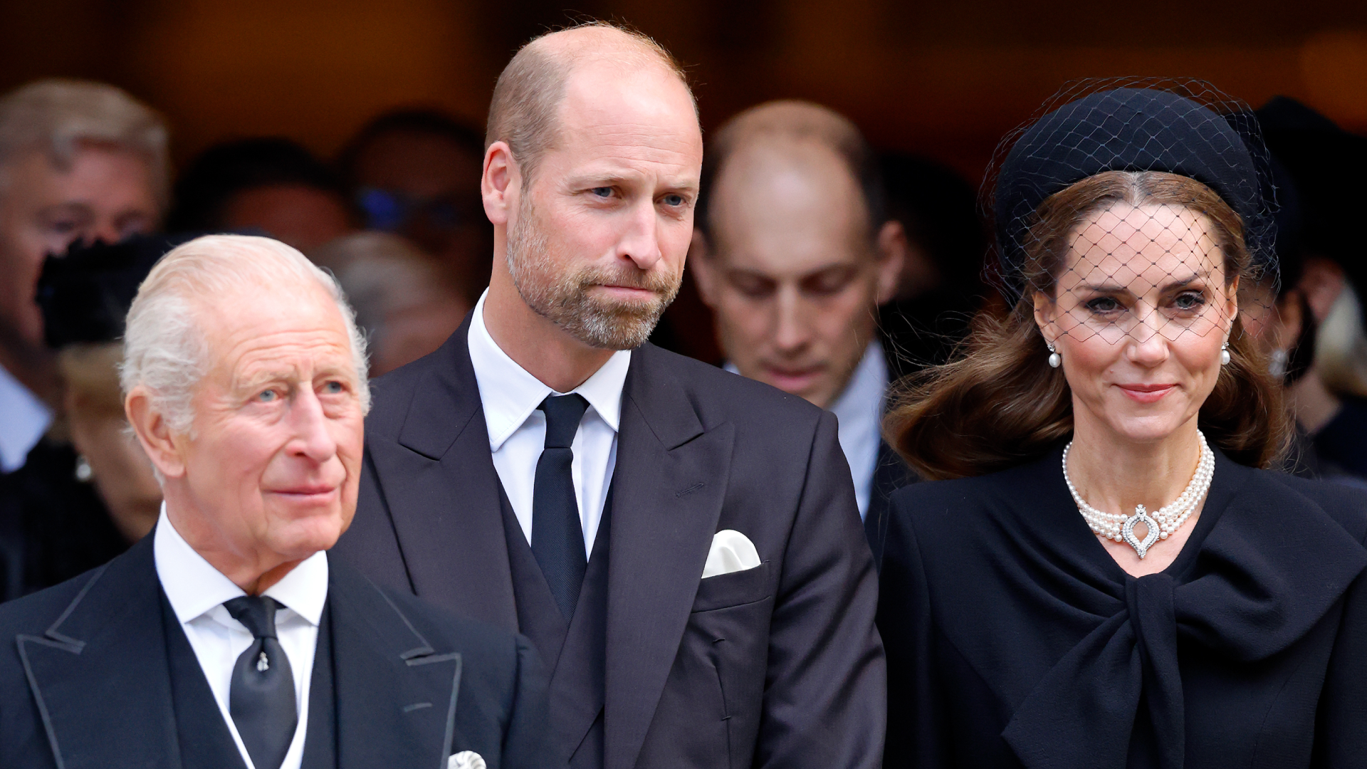 King Charles, Prince William and Princess Kate standing in a row wearing black outfits at the Duchess of Kent&#039;s funeral