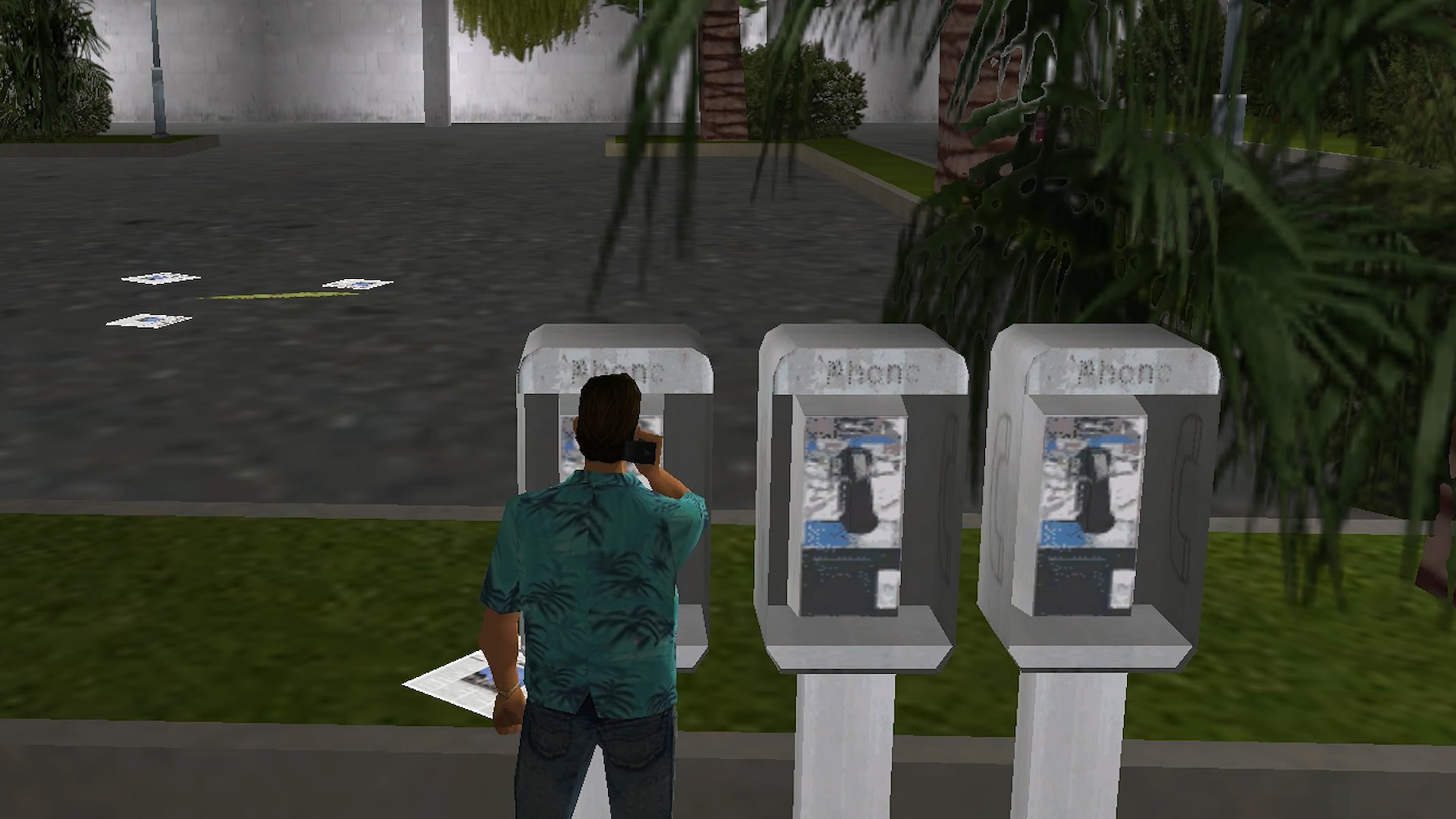 Man talking on pay phone