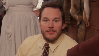 Chris Pratt as Andy Dwyer eating butter in Parks and Rec