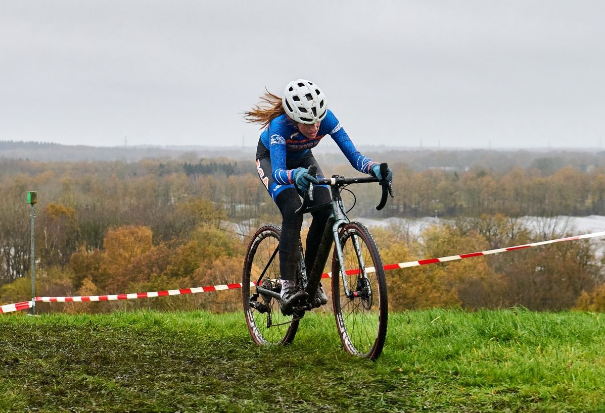 Ava White completes a climb on a race in the Netherlands