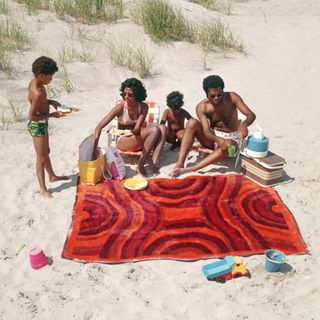 A vintage photo of a family beach day