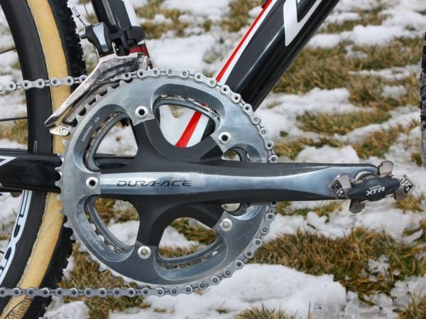 A Dura-Ace 7800-generation 48T outer ring is affixed to the 7900 crankset.