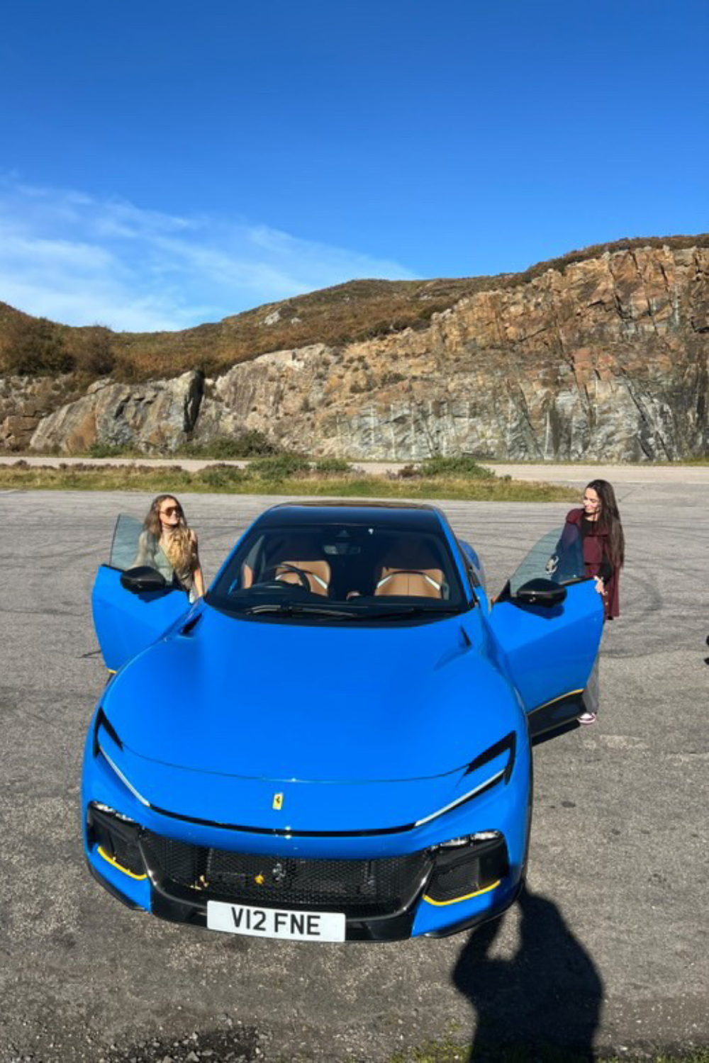 Lauren Cunningham and Cat Roberts in Ferrari Purosangue