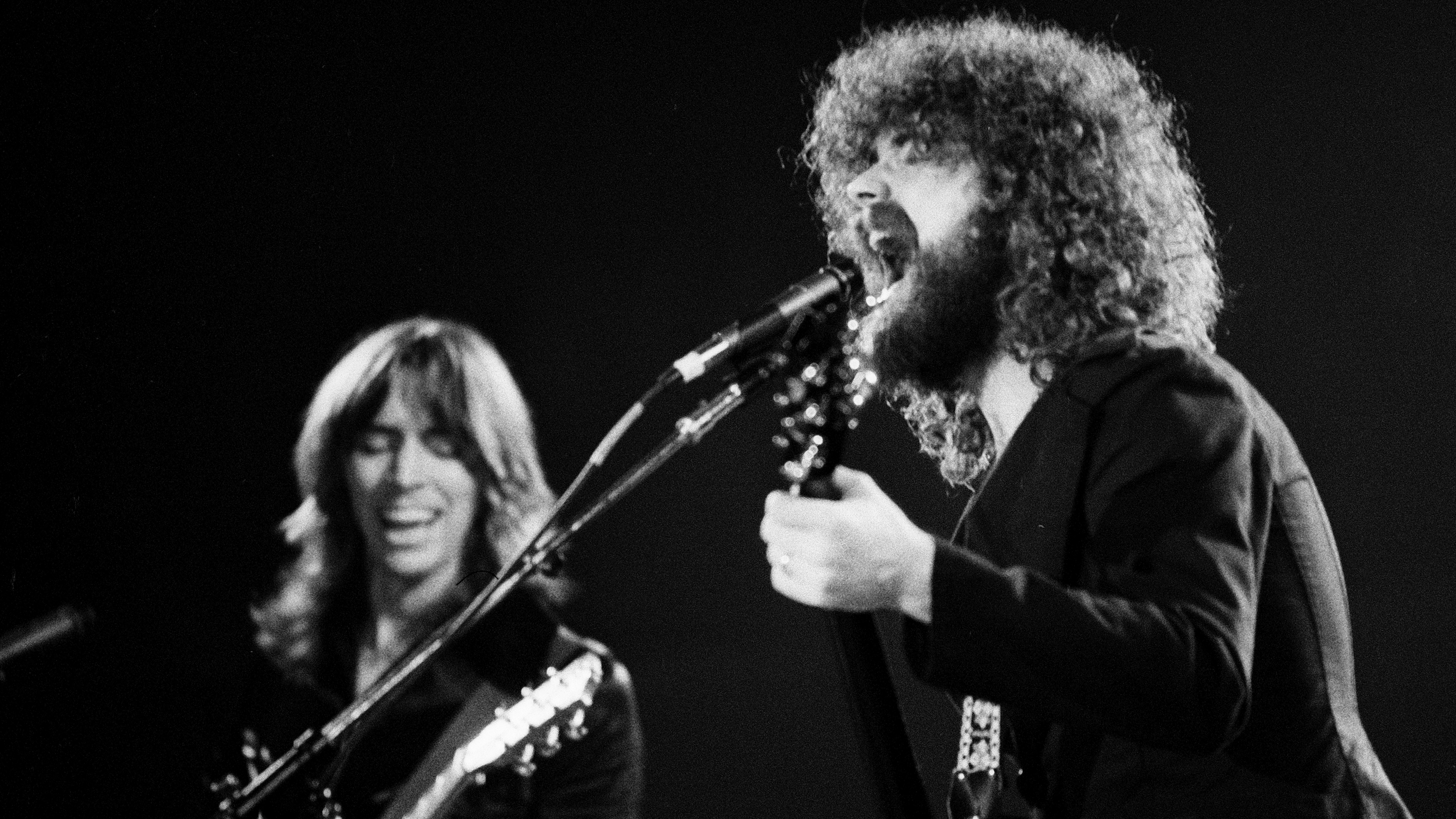 Brad Delp and Tom Scholz of Boston perform in concert at Long Beach Arena, March 16, 1977