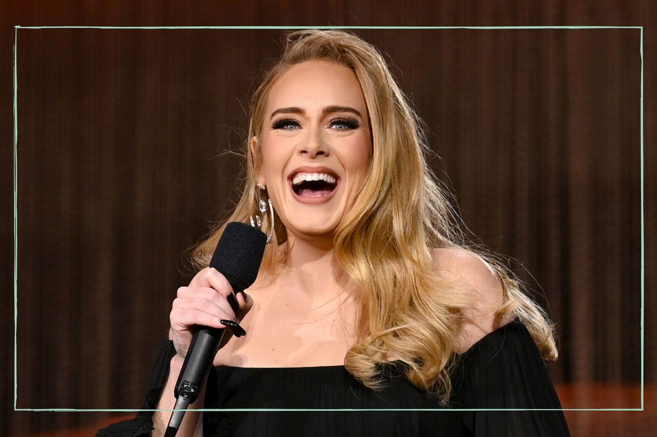 Adele&#039;s name - Adele laughing and holding a microphone on stage as American Express present BST Hyde Park in Hyde Park on July 02, 2022 in London, England