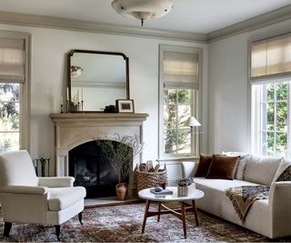 Neutral living room with a stone fireplace