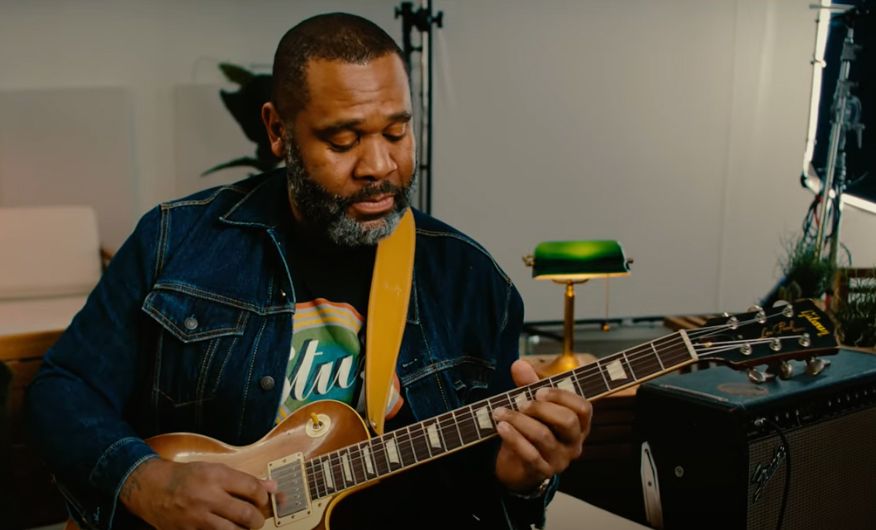 Guitarist Kirk Fletcher playing a Gibson Les Paul 