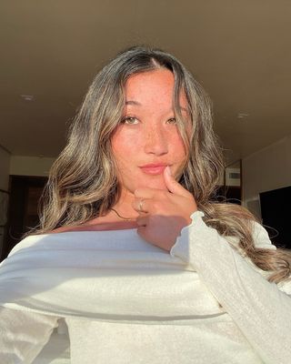 Content creator Brit Correia with glowing skin