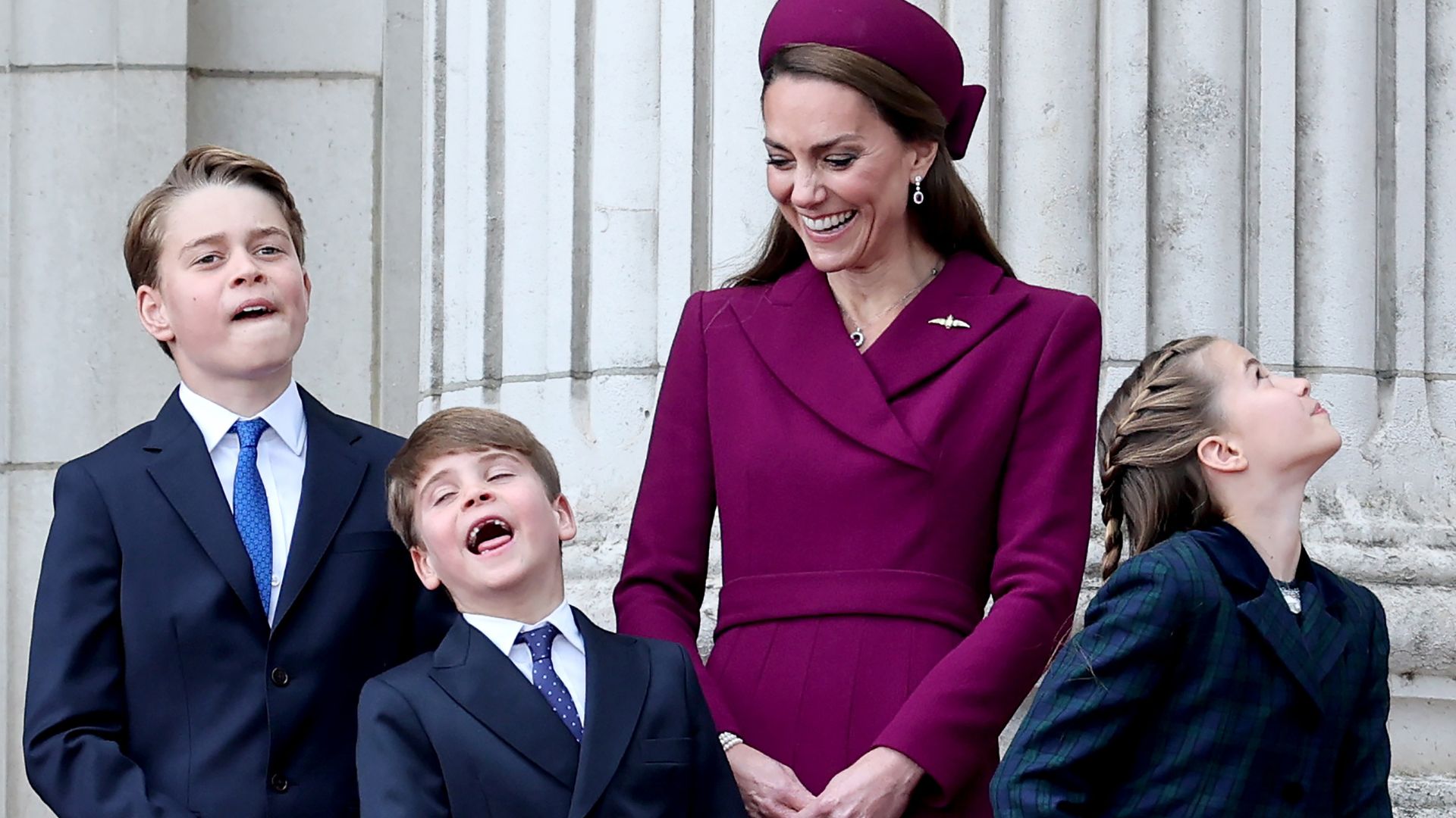 (L-R) Prince George, Prince Louis, Catherine, Princess of Wales and Princess Charlotte watch the fly-past on the balcony of Buckingham Palace, May 2025