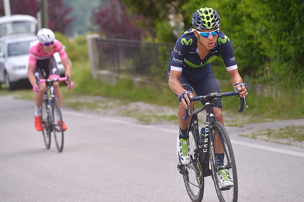 Andrey Amador (Movistar) attacks and Bob Jungels (Etixx-QuickStep) chases