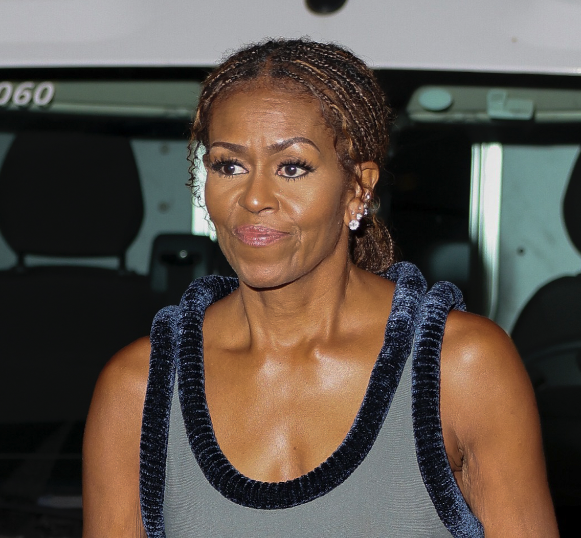 Michelle Obama was spotted attending Celine Dion&rsquo;s concert in Paris, where she made a stylish appearance in a Diotima dress and carried a Liffner bag