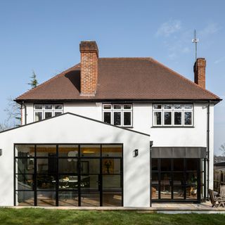White house with modern dining extension