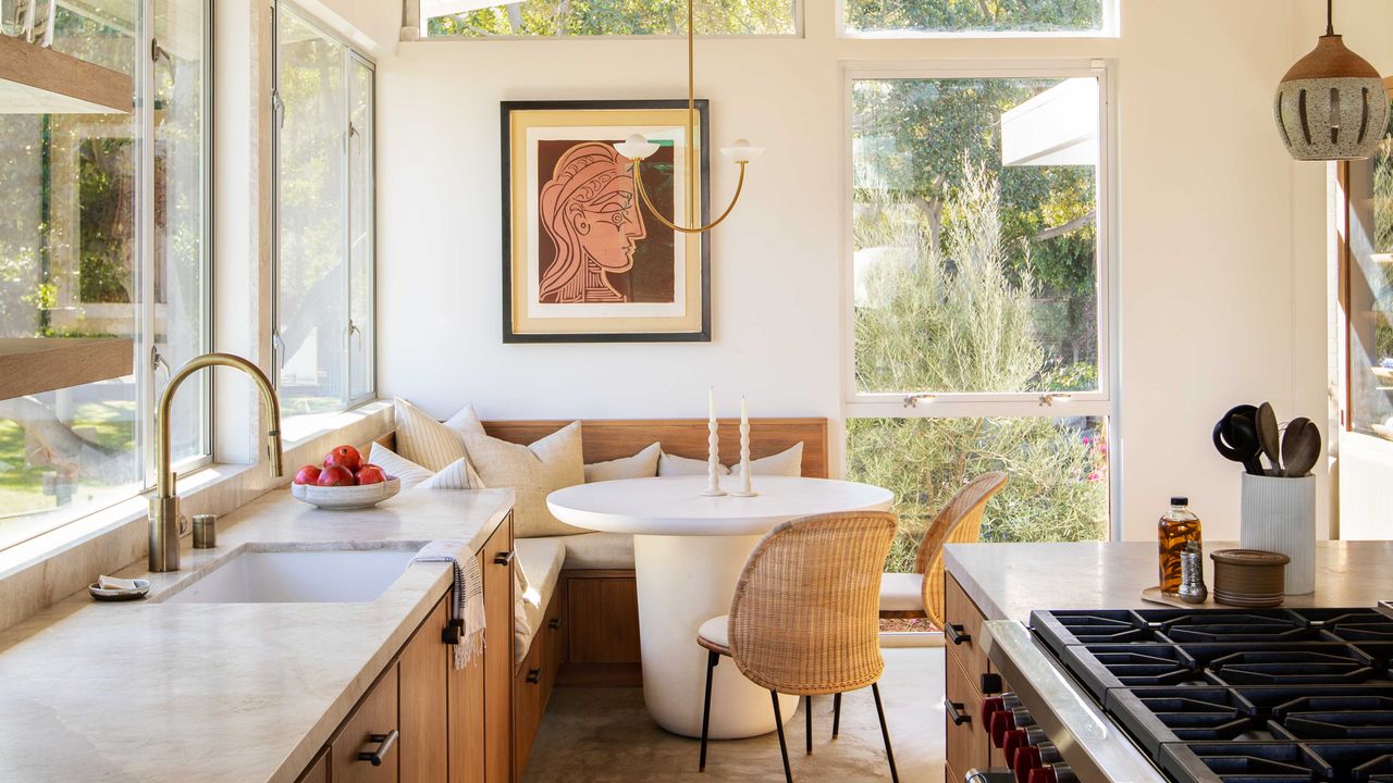 a kitchen diner with artwork on the wall