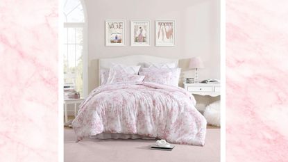A pink floral Wayfair bedroom with a bed, wall art, and white nightstands