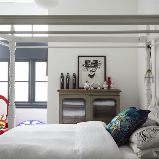bedroom with white bed and vintage vanity
