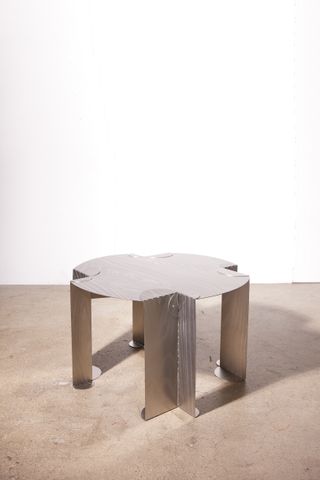 Stainless steel table on concrete floor