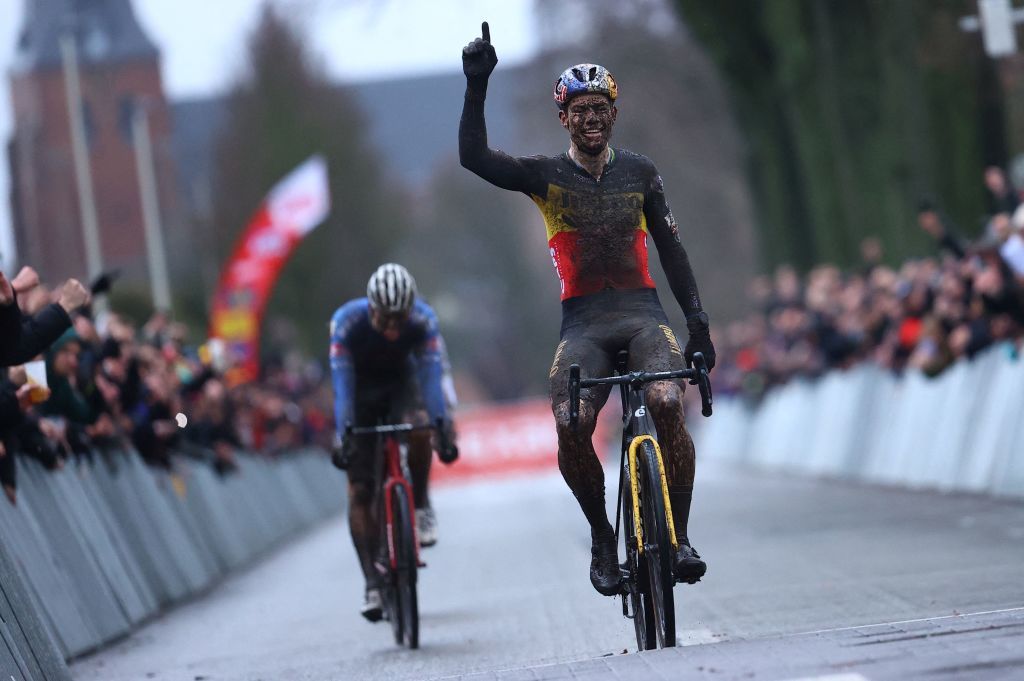 Belgian Wout Van Aert celebrates as he crosses the finish line at the end of the mens elite race of the cyclocross cycling event race 68 during the Exact Cross competition on December 30 2022 in Loenhout Belgium Belgium OUT Photo by DAVID PINTENS BELGA AFP Belgium OUT Photo by DAVID PINTENSBELGAAFP via Getty Images
