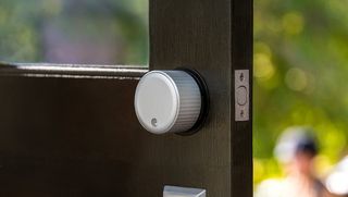 August Wifi Smart Lock on an open door