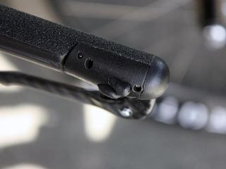 Shimano Dura-Ace Di2 shift buttons are perfectly integrated into the base bars on Sky's Pinarello Graals. For the record, Shimano deny any involvement