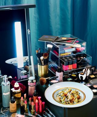 Cindy Sherman's gnocchi with sage and butter sauce on a dressing table with makeup