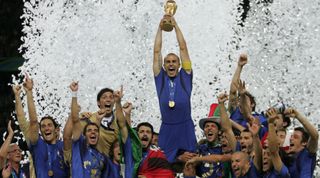 Italy captain Fabio Cannavaro lifts the trophy after Italy beat France on penalties to win the 2006 World Cup at the Olympiastadion in Berlin, Germany on July 9, 2006.