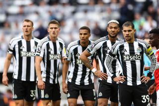 Newcastle United's players look on during their clash with Arsenal