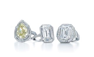 Sparkles for days: a 5.39 carat pear-shaped yellow green diamond with round, baquette and square white diamonds