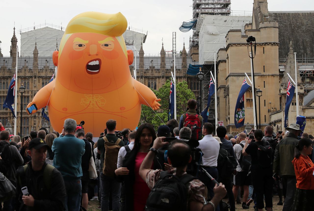 A &amp;quot;Baby Tump&amp;quot; balloon flies over London.