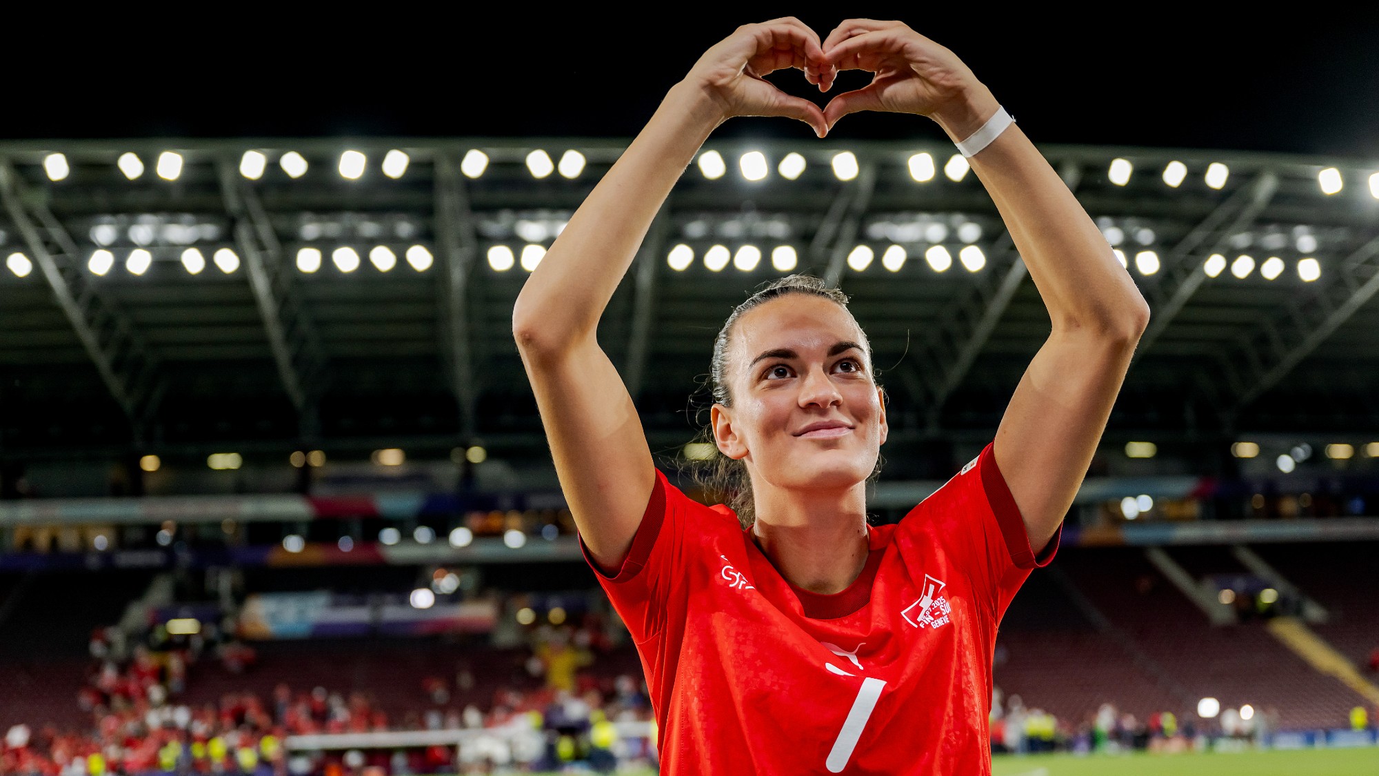 Switzerland's Riola Xhemaili celebrates after the team's Euro victory over Finland