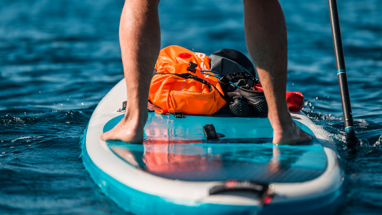 Someone stood on a paddle board