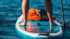 Someone stood on a paddle board