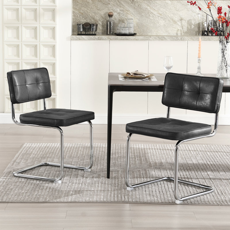 Corrigan Studio&amp;reg; Aveon 19.3" H Mid Century Modern Tufted Leather Side Dining Chair With Steel Frame &amp;amp; Reviews | Wayfair