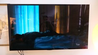 While showing the film Aftersun, the LG C2 OLED TV has glare on the right side of the screen