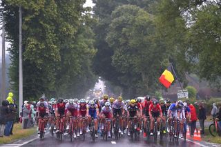 The peloton in the rain during stage 2 at the Tour de France