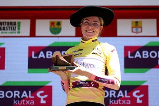 SAN SEBASTIAN SPAIN MAY 15 Demi Vollering of Netherlands and Team SD Worx Yellow Leader Jersey and txapela trophy celebrates at podium as race winner during the 1st Itzulia Women 2022 Stage 3 a 1398km stage from DonostiaSan Sebastin to DonostiaSan Sebastin ItzuliaWomen UCIWWT on May 15 2022 in San Sebastian Spain Photo by Gonzalo Arroyo MorenoGetty Images