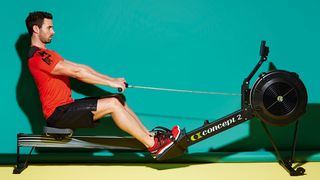 Man rowing on a Concept2 rowing machine