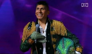 Nairo Quintana appears on TV singing contest in chameleon costume after Il Lombardia