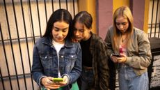 Teen girls on their smartphones