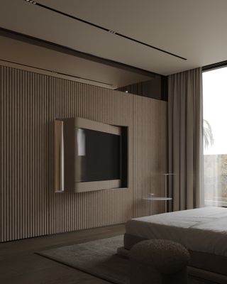 partition wall in bedroom with rotating tv unit