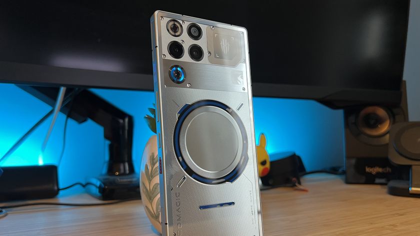 RedMagic 11 Pro gaming phone on a wooden desk