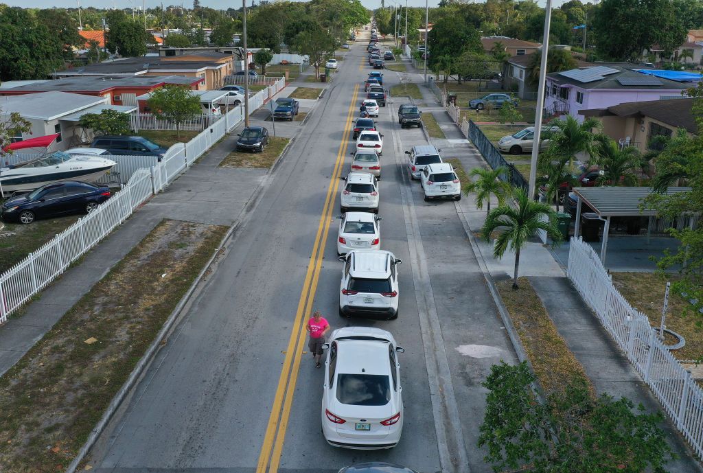 Vehicles lining up to receive unemployment applications