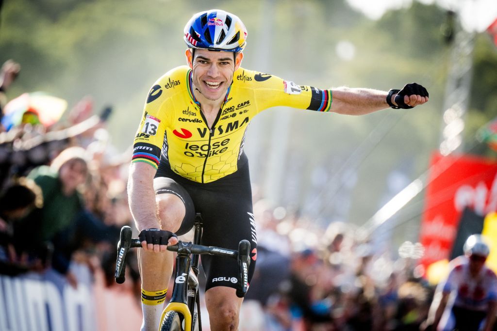 Belgian Wout van Aert celebrates as he crosses the finish line to win the men's elite race at the cyclocross cycling event in Benidorm, Spain, Sunday 21 January 2024, stage 13/14 in the World Cup ranking. BELGA PHOTO JASPER JACOBS (Photo by JASPER JACOBS / BELGA MAG / Belga via AFP)