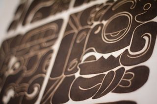 This silkscreen shows dates in the Maya Long Count Calendar and a sacred calendar called the Tzolk'in. The silkscreen is based on carvings found in Quirigua, Guatemala.