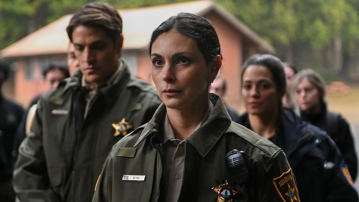 Morena Baccarin standing in front of other officers from the Sheriff&#039;s department in Fire Country.