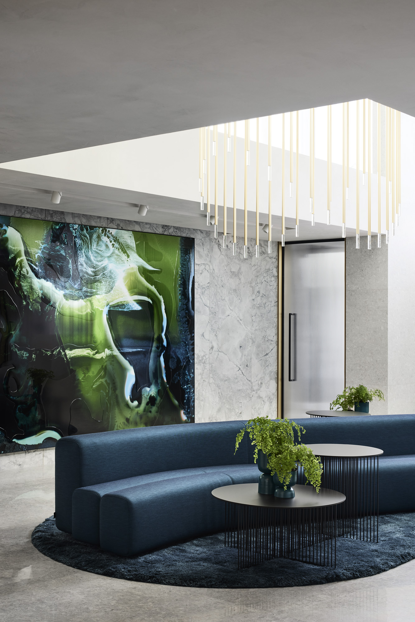 blue sofa and art at Curatorial House in Melbourne