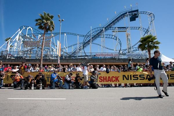 Hurricane watch: Photographers await the sprint finish at the Santa Cruz Boardwalk.