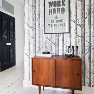 white painted floor hallway and wooden sideboard