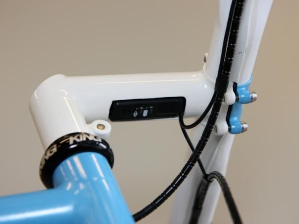 The Shimano Dura-Ace Di2 control box is neatly tucked up inside the custom stem on this Rob English road bike.