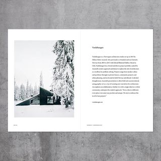 spread of book showing words and cabin in snowy landscape